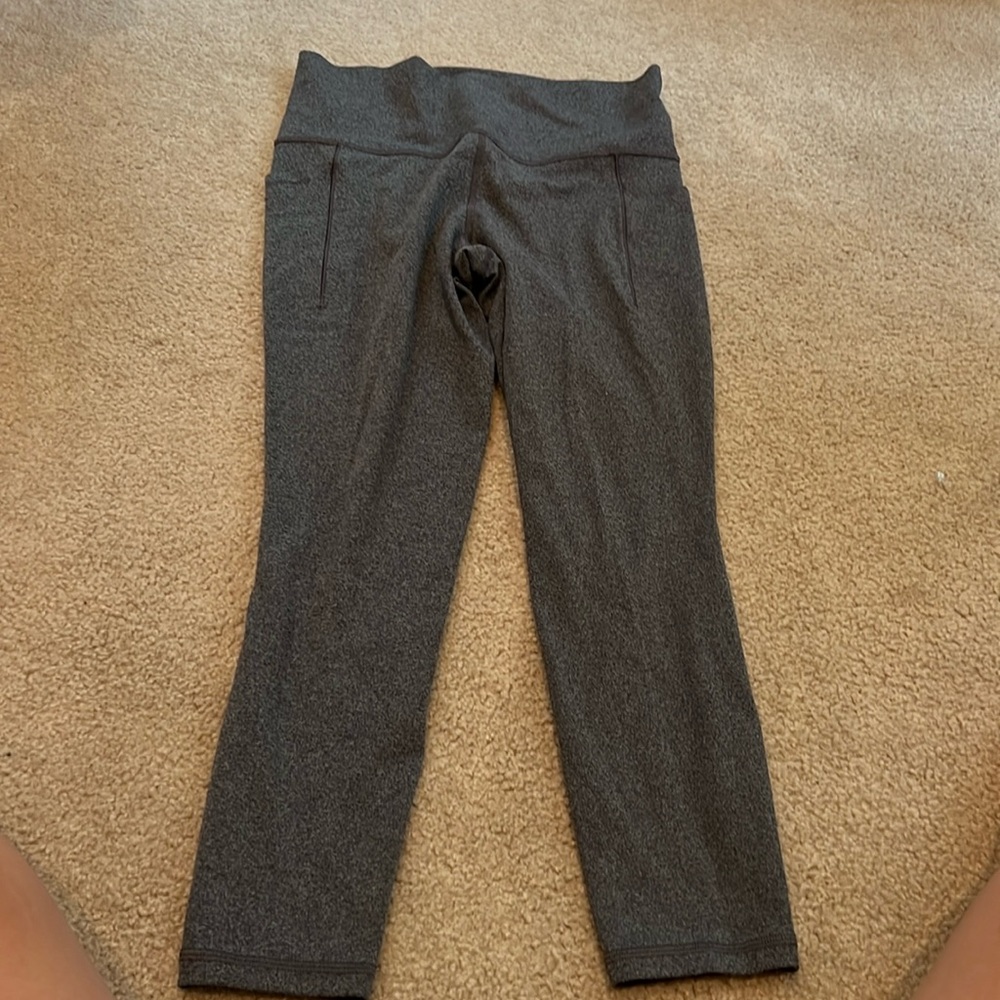 Athleta Salutation Stash Pocket II 7/8 Tight